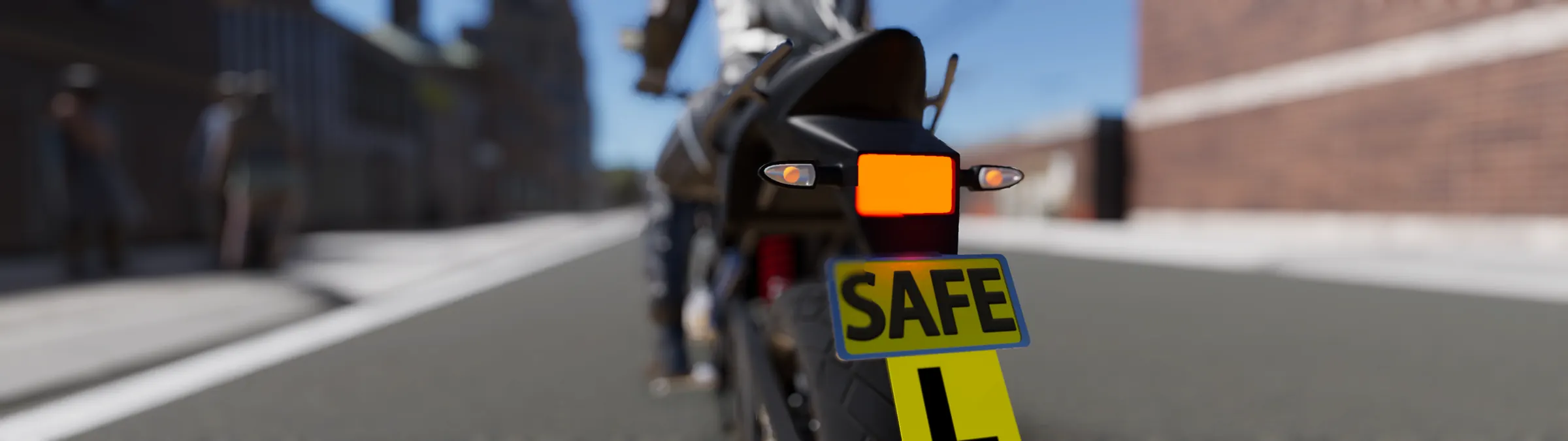 A learner motorcyclist with L plates